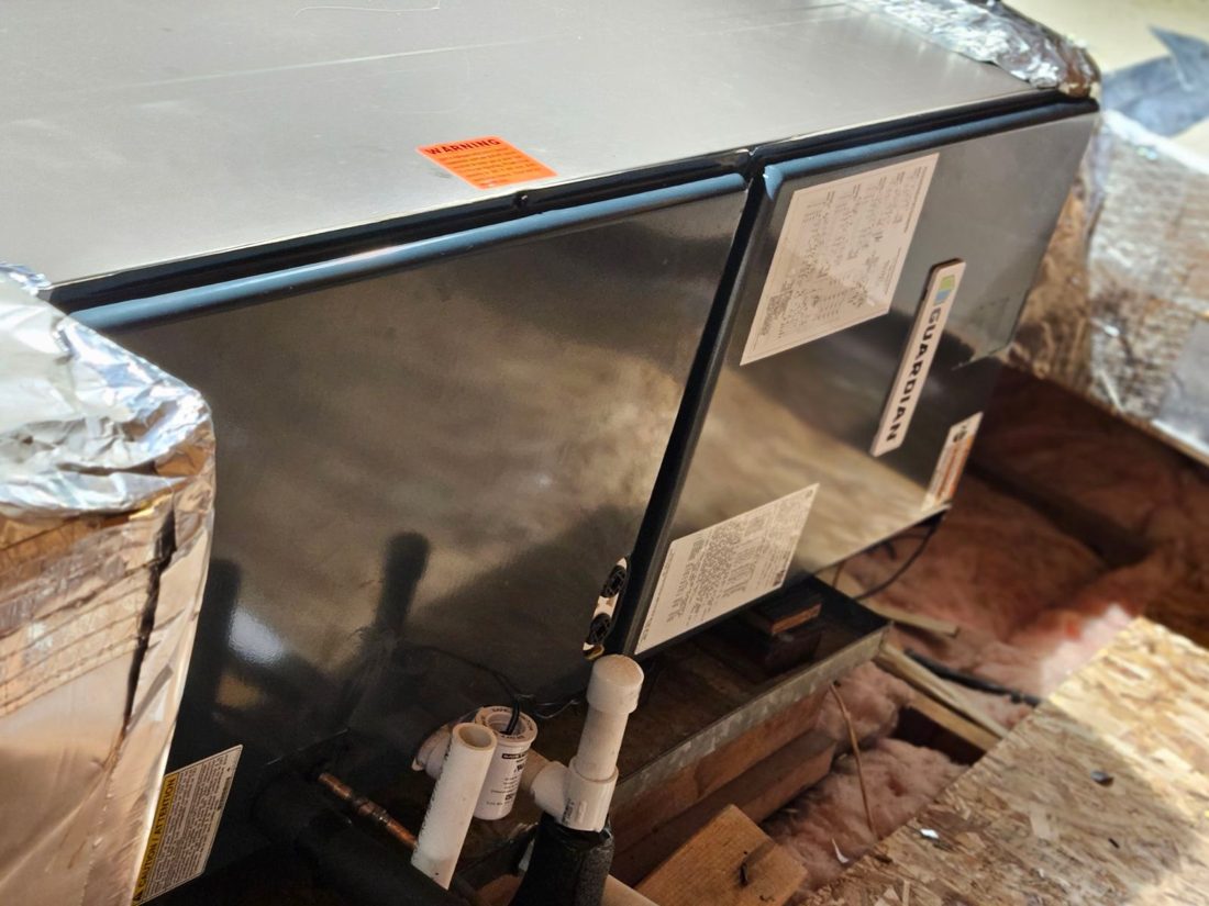 New air handler installed and sealed in the attic.